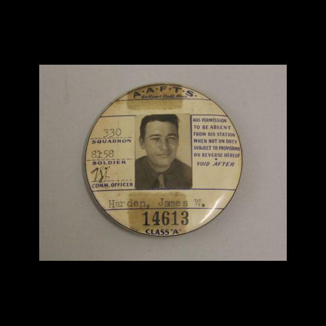 A color photograph of James W. Harden’s off-duty button. A black-and-white headshot of Harden is in the center. His name and ID number are below the photo. His squadron, soldier number, and commanding officer information is on the left. The right text states he has been given permission to be off base.